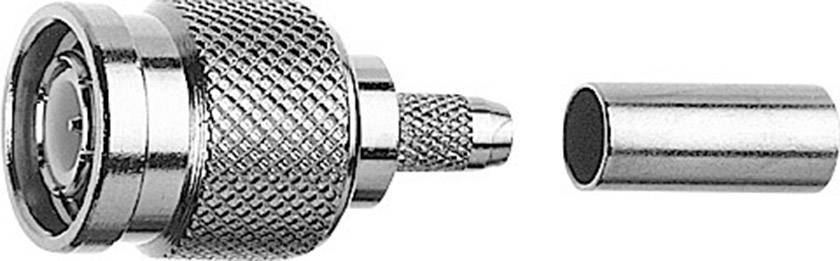 A silver coaxial plug comprising a main housing with a ridged surface and a separate cylindrical cable end.