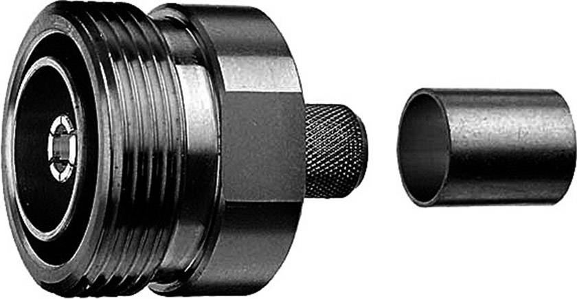 Small, metallic, cylindrical device with threading, likely an adapter or connection piece, positioned next to a corresponding cylindrical insert.