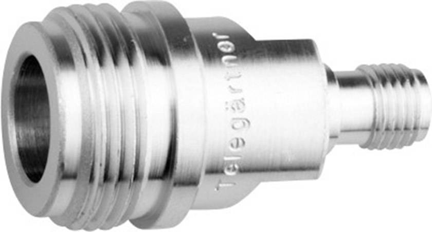Metal adapter with thread, labelled 'Telegärtner'. Used for cable connections in technical applications.
