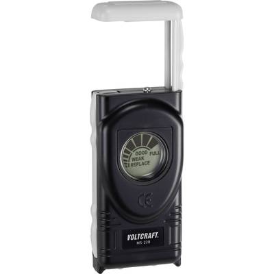 A black battery tester with display indicators for 'Good', 'Full', 'Weak', 'Replace'. Brand name 'Voltcraft' printed at the bottom.