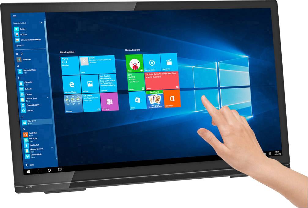 A hand touches the screen of a switched-on laptop with a tile-style interface in the Windows design.