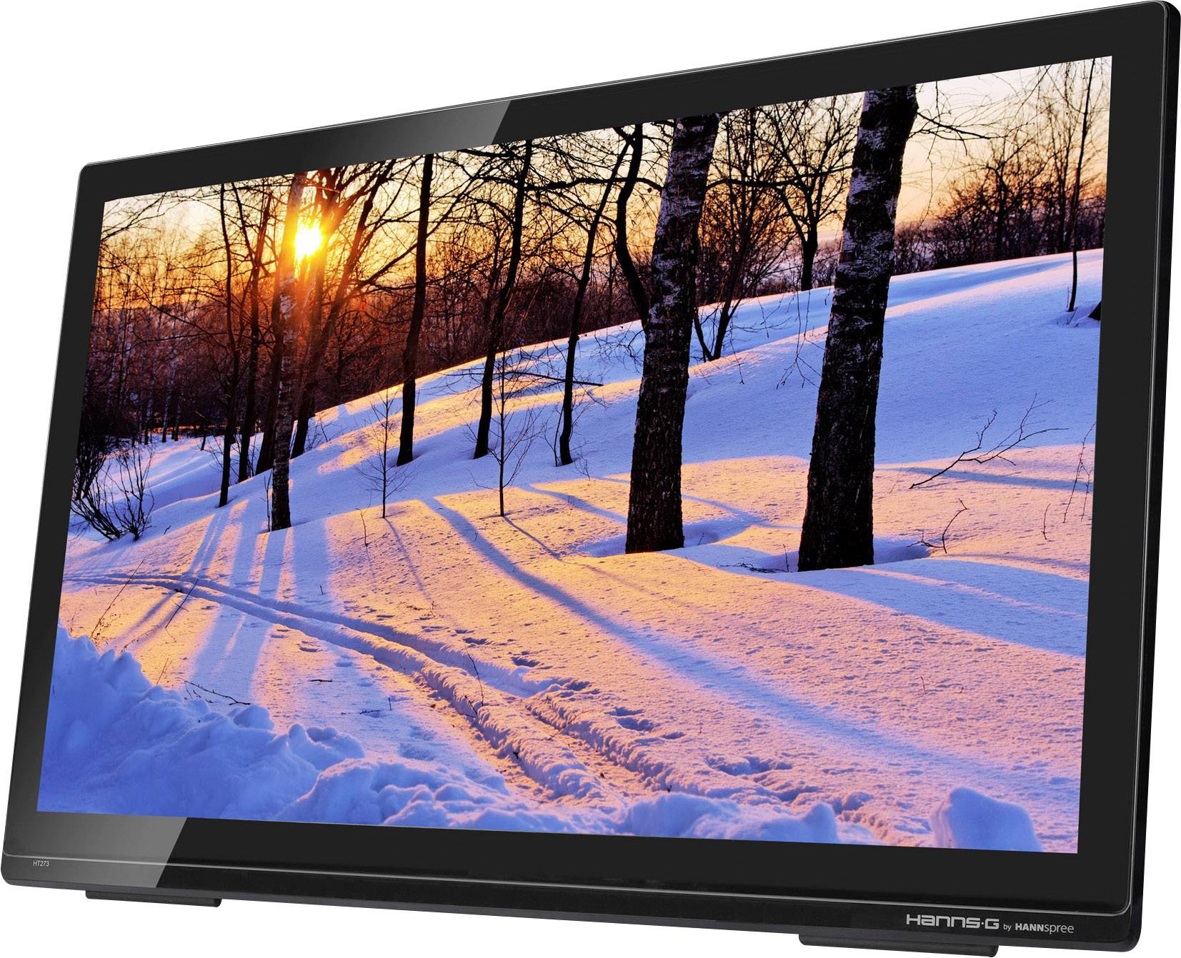 A monitor displays a winter scene with snow-covered ground and bare trees at sunset.