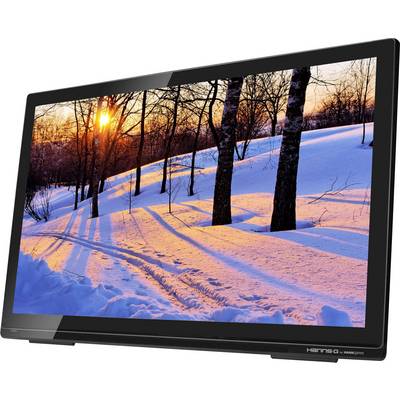 A monitor displays a winter scene with snow-covered ground and bare trees at sunset.
