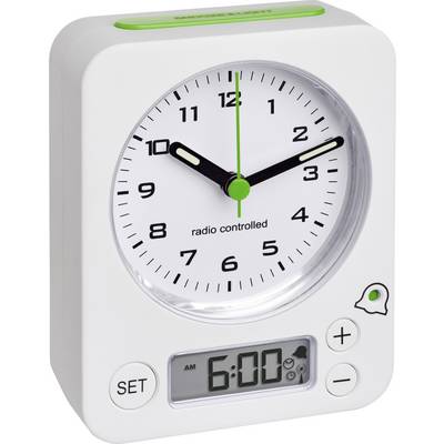 A white, radio-controlled alarm clock with an analogue dial and digital display. The time shows 6:00.