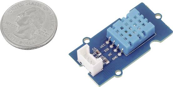'A blue moisture sensor with five connection pins next to a quarter dollar coin, illustrating the sensor's size.'