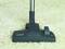 A vacuum cleaner with a black head on a light beige carpet. Its key feature is simple operation and efficient cleaning.