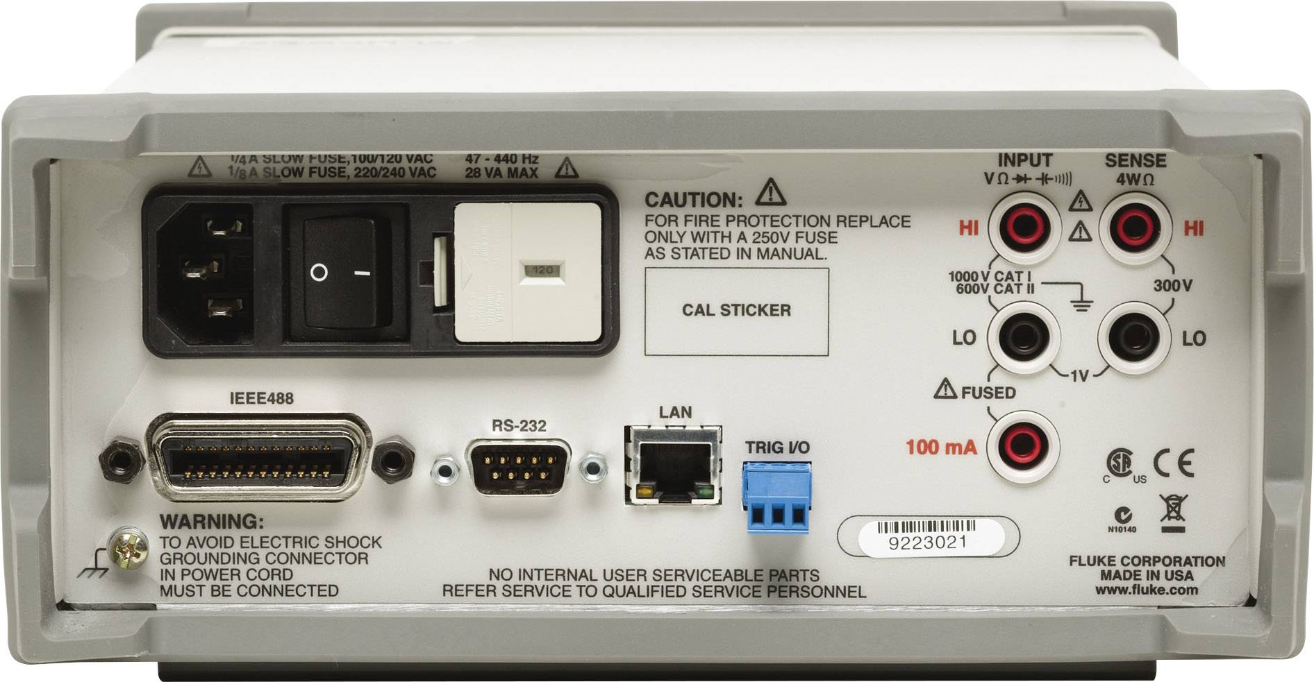 The rear side of an electronic measuring device with various ports, switches, and safety warnings for usage and operation.