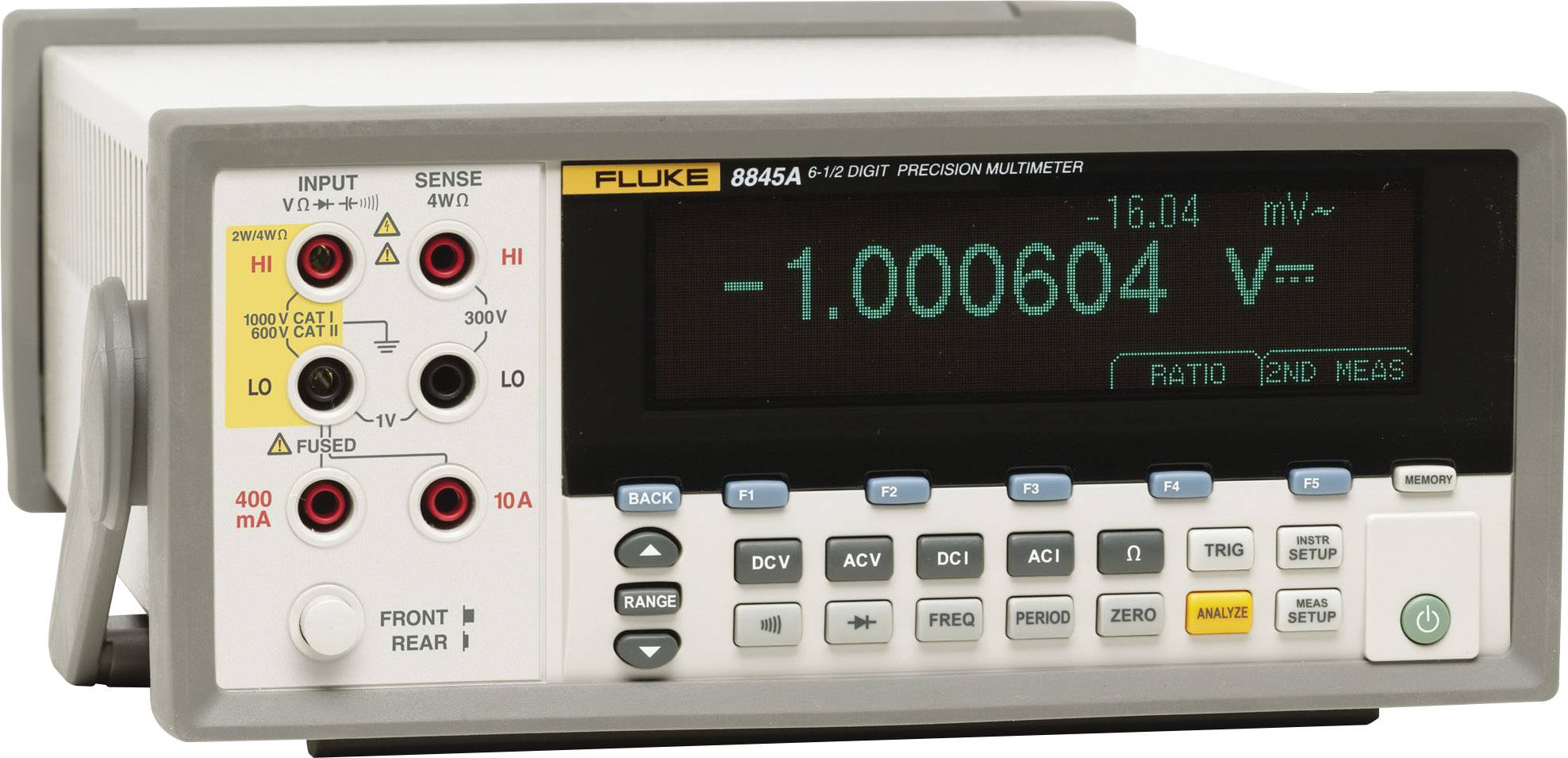A digital precision measuring instrument displays '-1.000604 V' on the screen. On the left are sockets for various measurement functions.