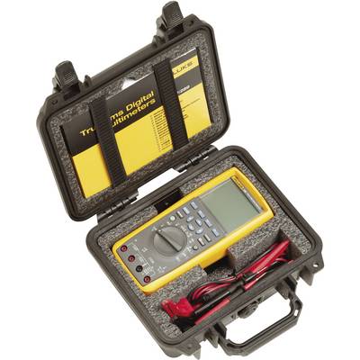 A digital multimeter in a black hard-shell case with foam lining. The multimeter is yellow. An instruction manual is lying on top.