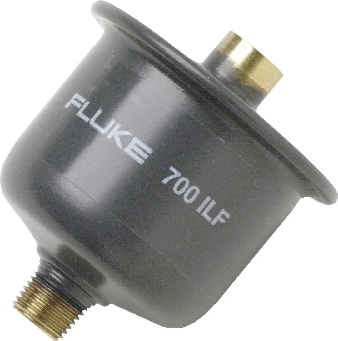 A black adapter with the inscription 'FLUKE 700 ILF'. At the top, there is a brass connection, and at the bottom, a threaded connection.