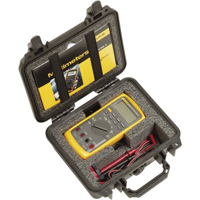 A yellow multimeter in an open black case with foam lining. A brochure about multimeters is on the case lid.
