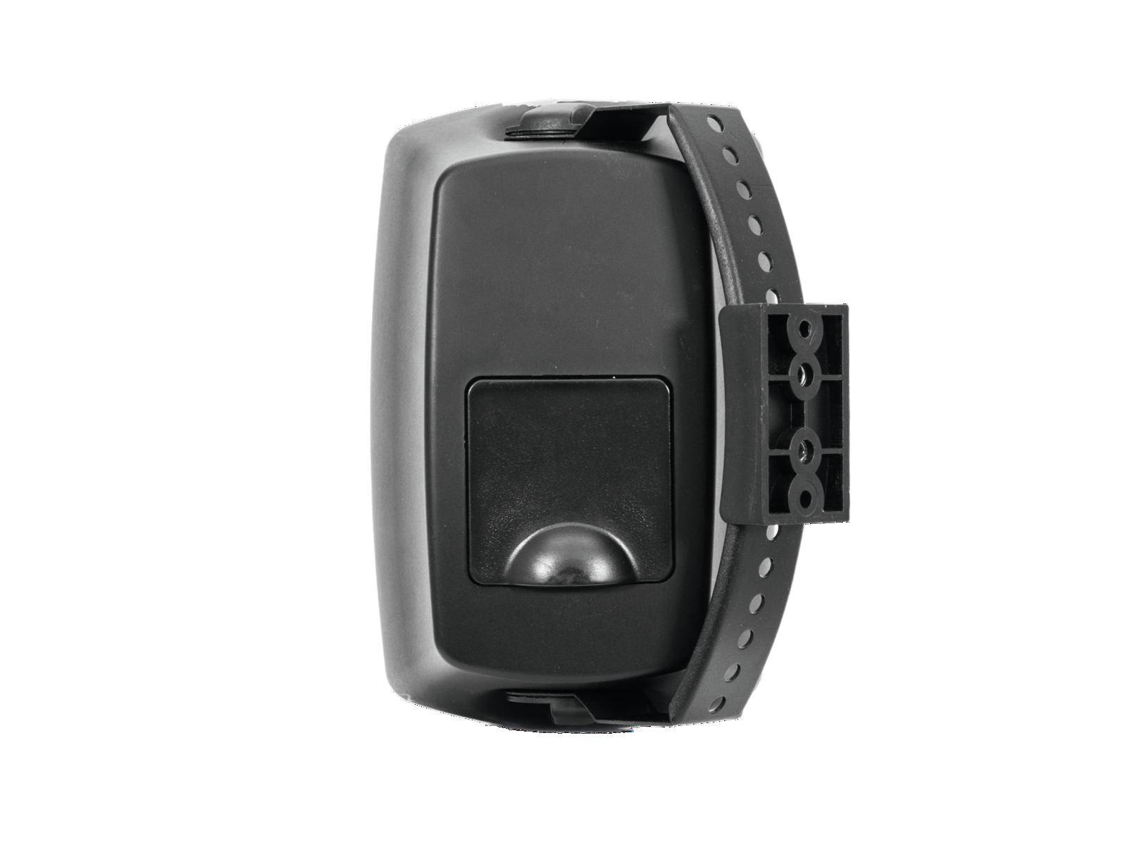 The image shows an electronic door opener in black with a mounting bracket, photographed from above.