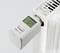 A digital thermostat on a white radiator shows 24.0 degrees Celsius.