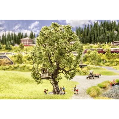 A large tree with a treehouse, ladder, and children playing in the foreground. In the background, a tractor and trains in a landscape.