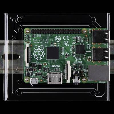 'Raspberry Pi Model B+ V1.2' circuit board mounted on a white board, showing electronic components such as USB ports and HDMI connector.