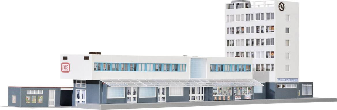 A model of a modern railway station building with a flat roof and tower. The main building has large window facades and the Deutsche Bahn logo.