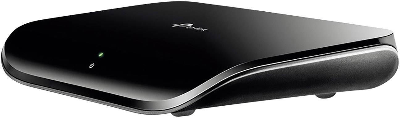 Black network switch with minimalist design, green LED light on the front panel and TP-Link logo at the top.
