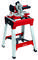 A red and silver mitre saw mounted on a sturdy stand. A tool for precise cutting of wood and other materials.