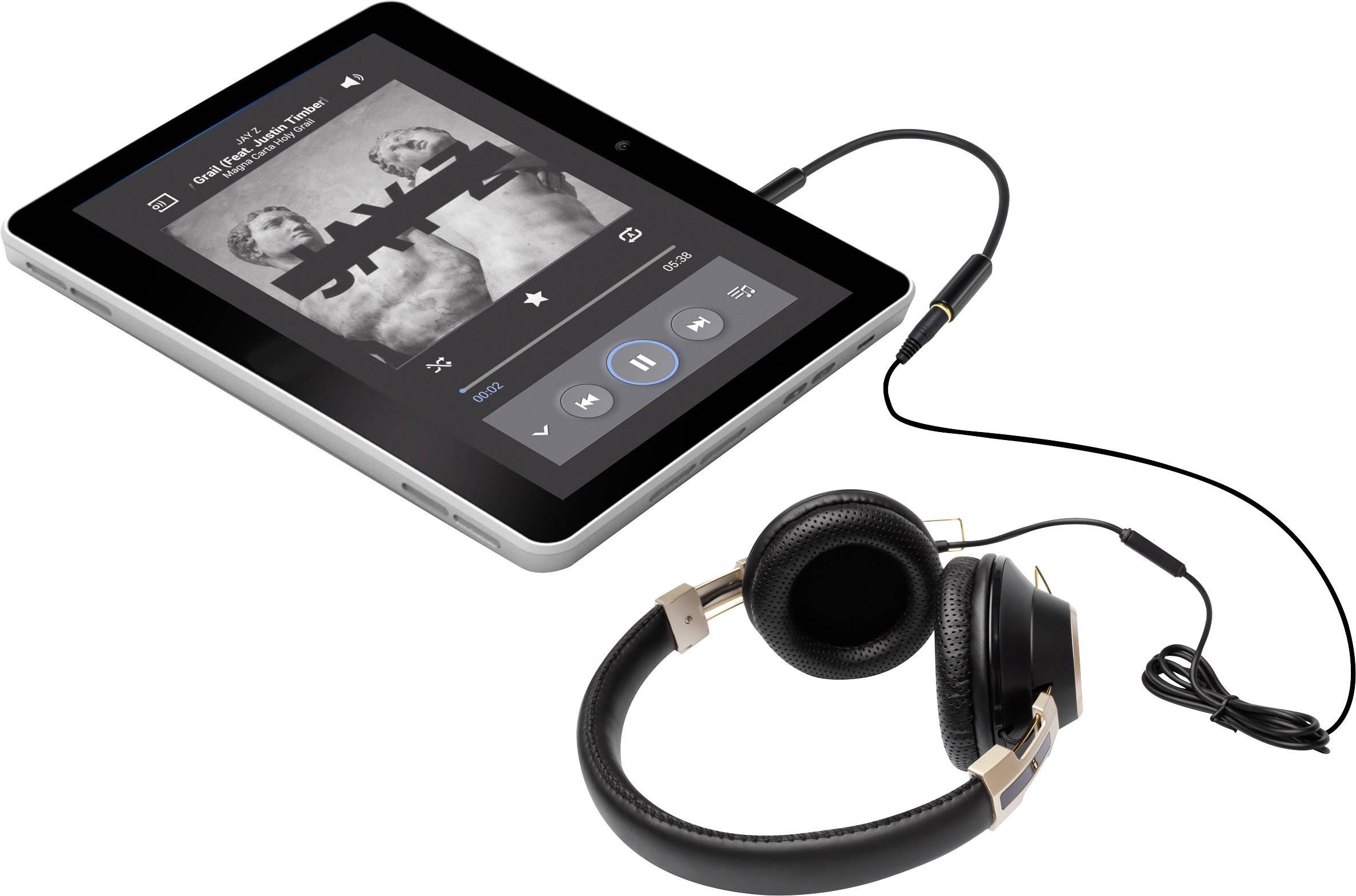 A tablet with connected black headphones displays a music player interface showing song information and playback controls.