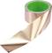 Roll of shiny copper foil with a green inner core, wound up and partially unrolled, material for electrical engineering or crafts.