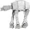 A silver model of a four-legged walking robot, familiar from a science fiction film, displays detailed mechanical structures.