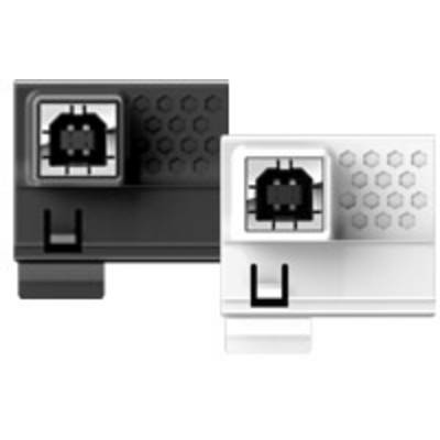 Two computer keycaps, one black, one white, lying side by side. Hexagonal pattern on the keycaps.