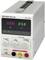 The image shows a grey laboratory power supply 'BASEtech BT-155' with a digital display, three rotary knobs for voltage adjustment, and connections.
