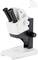 A white and black stereo microscope on a white background, suitable for detailed scientific investigations.
