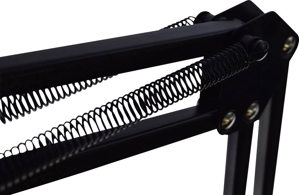 Close-up of a black metal spring structure, possibly part of a stand or arm, with springs and screws visible.