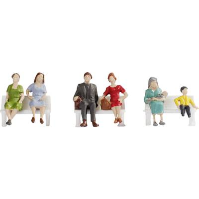 'Six coloured miniature figures seated on benches in various poses; a woman with a baby in green, a man in black with a woman in red.'