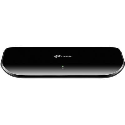 A black TP-Link network switch with a green illuminated LED indicator on the front, suitable for connecting multiple devices.