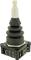 A black joystick with multiple buttons and a silver handle, suitable for industrial controls.