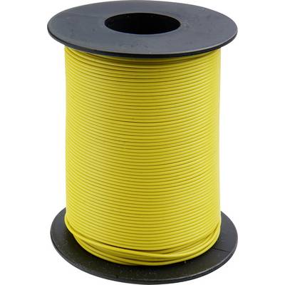 Large coil with yellow wire, standing upright on a table. The wire is tightly wound, the coil has black edges.
