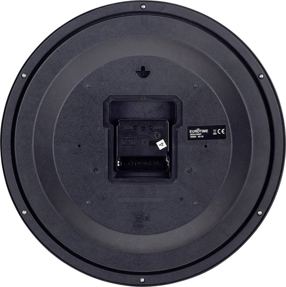 Back of a round black wall clock with battery compartment in the centre, surrounded by screw holes.