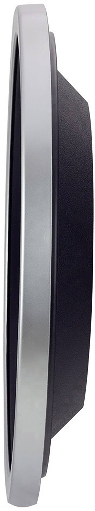 Silver and black round disc made of metal and plastic, viewed from the side.