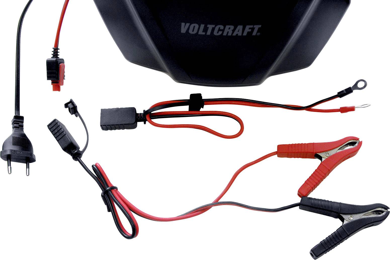 Charger with two cables: One with crocodile clips, the other with a European socket connection. Marked 'VOLTCRAFT'.