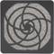 Abstract black artwork on a square background, composed of intertwined lines in a geometric pattern.