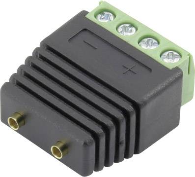 A black adapter with a green connection block and screw terminals. The adapter has a positive and negative symbol on its surface.