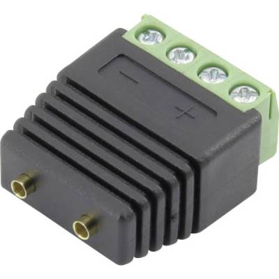 A black adapter with a green connection block and screw terminals. The adapter has a positive and negative symbol on its surface.