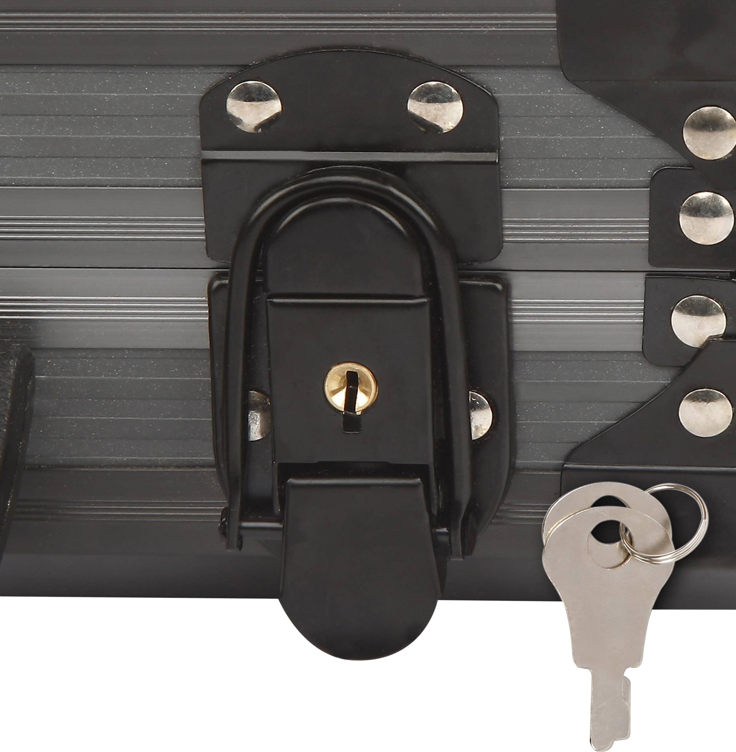 Grey padlock on a metal box, locked, with a key in the keyhole and a spare key beside it.