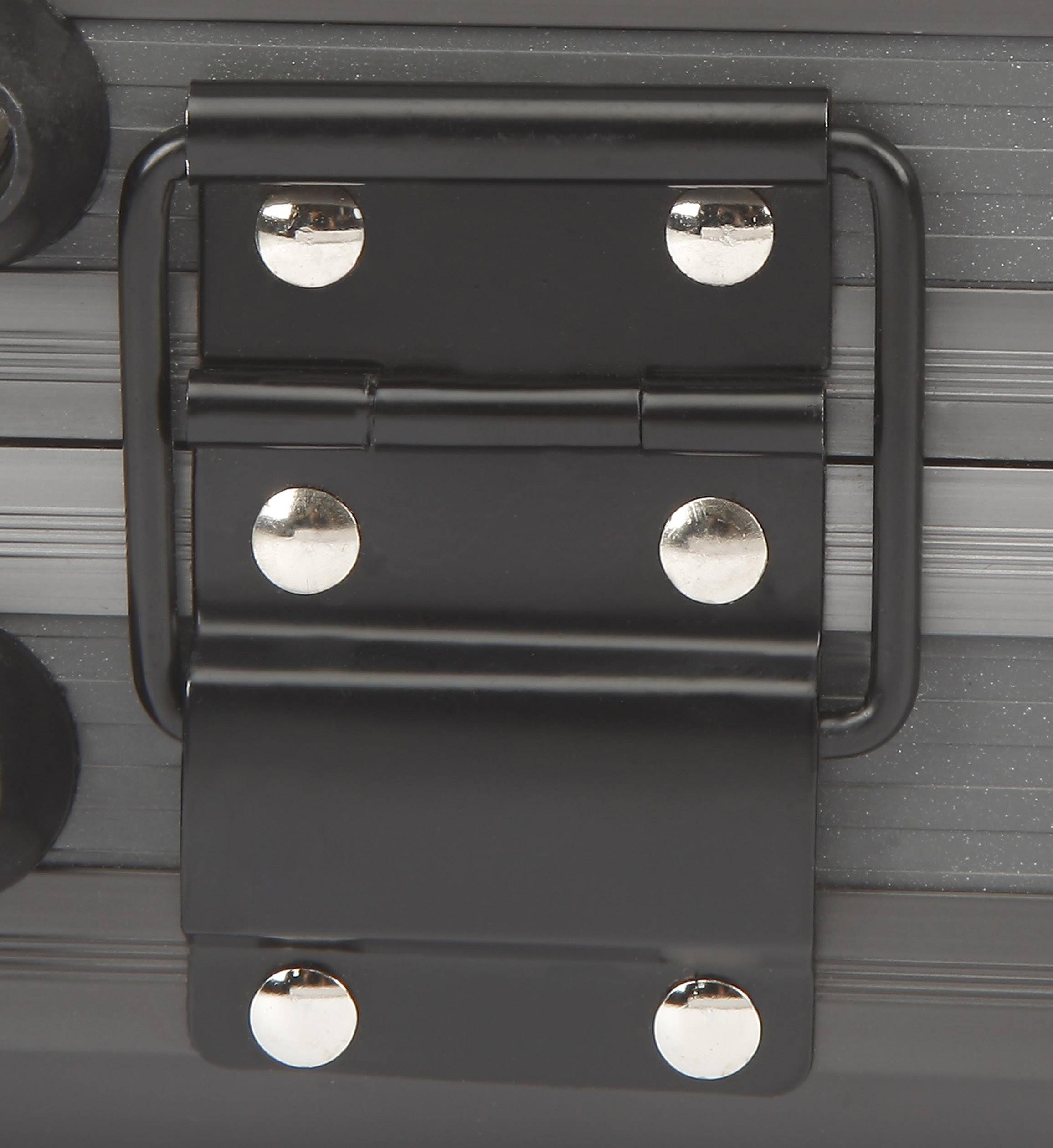 Black metal hinge with silver screws, fastened to a grey, striped surface.