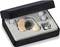 Hearing aid in a box with two replacement batteries and two additional earpieces.