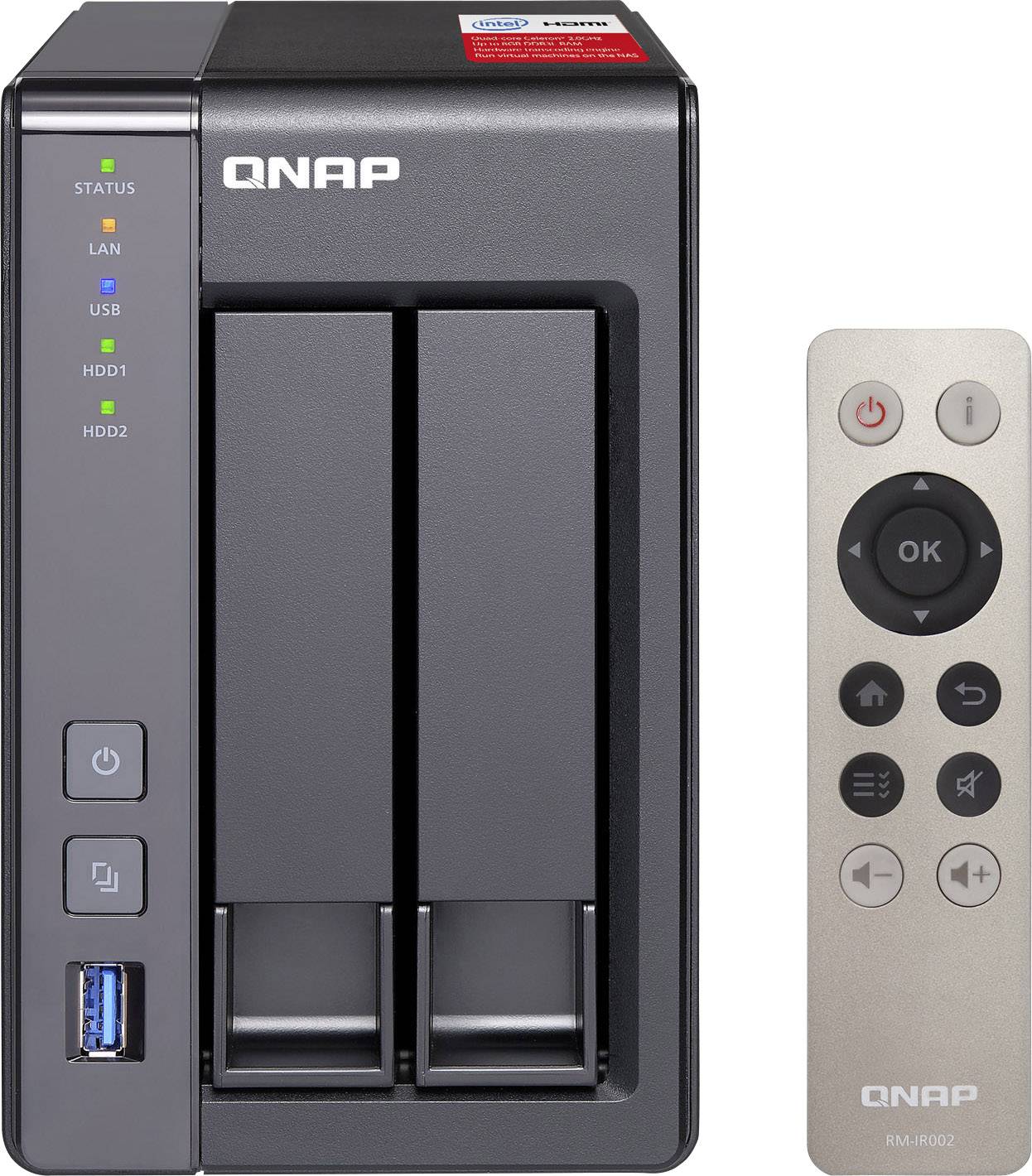 A black QNAP NAS device with two drive bays and multiple status lights. A remote control lies beside it.