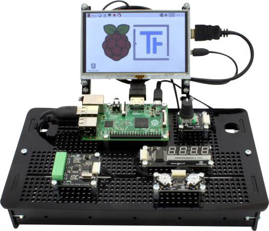 Raspberry Pi mounted on a black board, connected to a display and other modules. The display shows the 'Raspberry' and 'TF' logo.