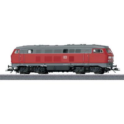 A red diesel locomotive of Deutsche Bahn is standing on a railway track. The locomotive has the inscription 'DB' on its side.