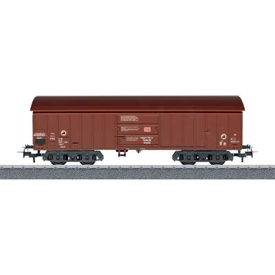 Goods wagon model on a railway track.
