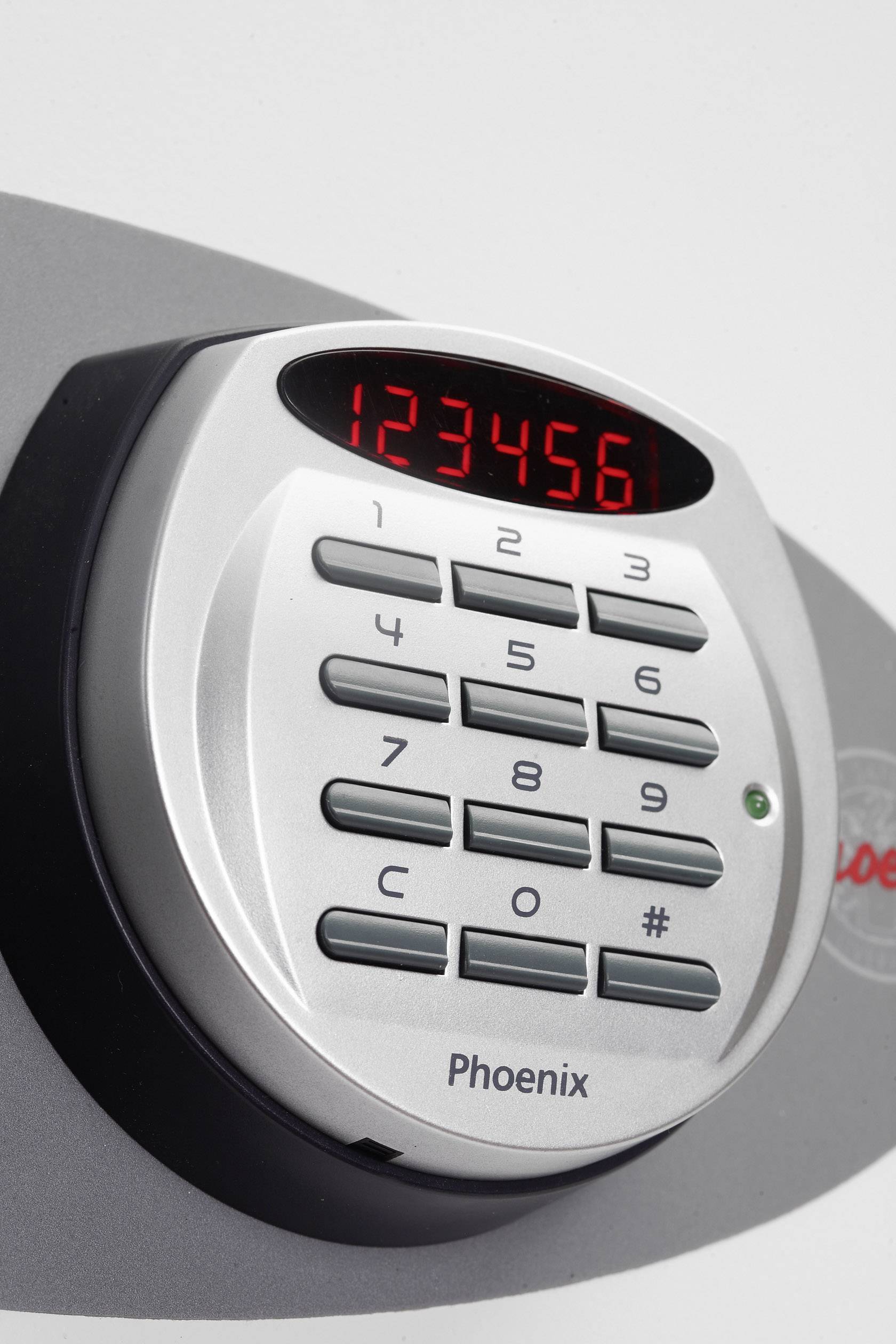 An electronic safe lock with a display for entering a six-digit code, mounted on a grey surface.