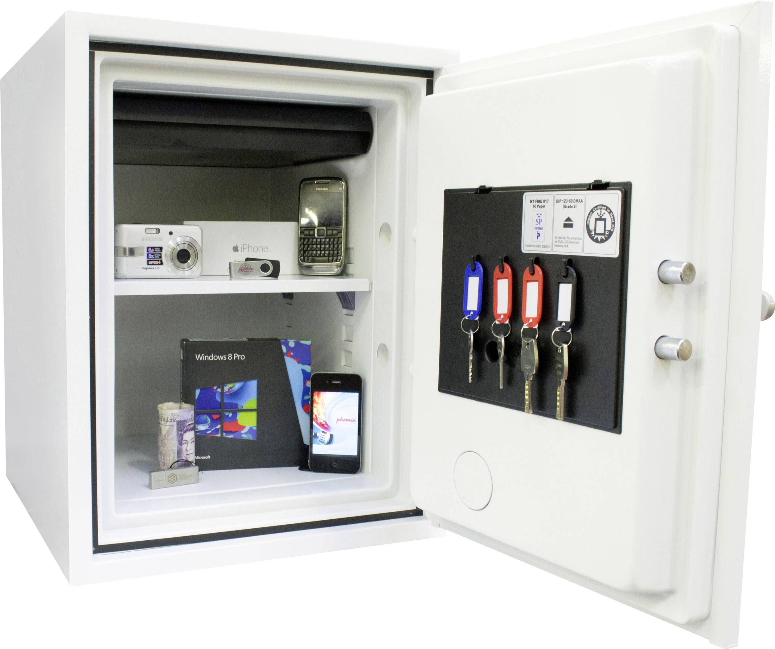 An open safe reveals cameras, a phone, software boxes and four keys on the inner door.