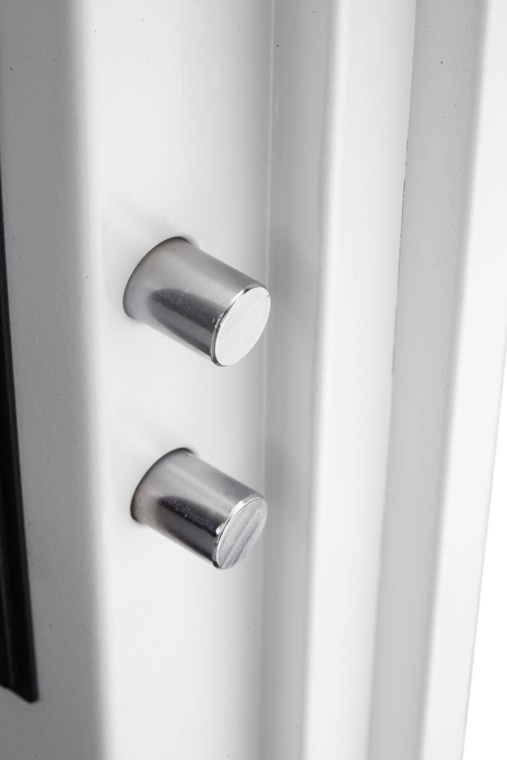 Two silver door bolts on a white door frame, used to secure the door.