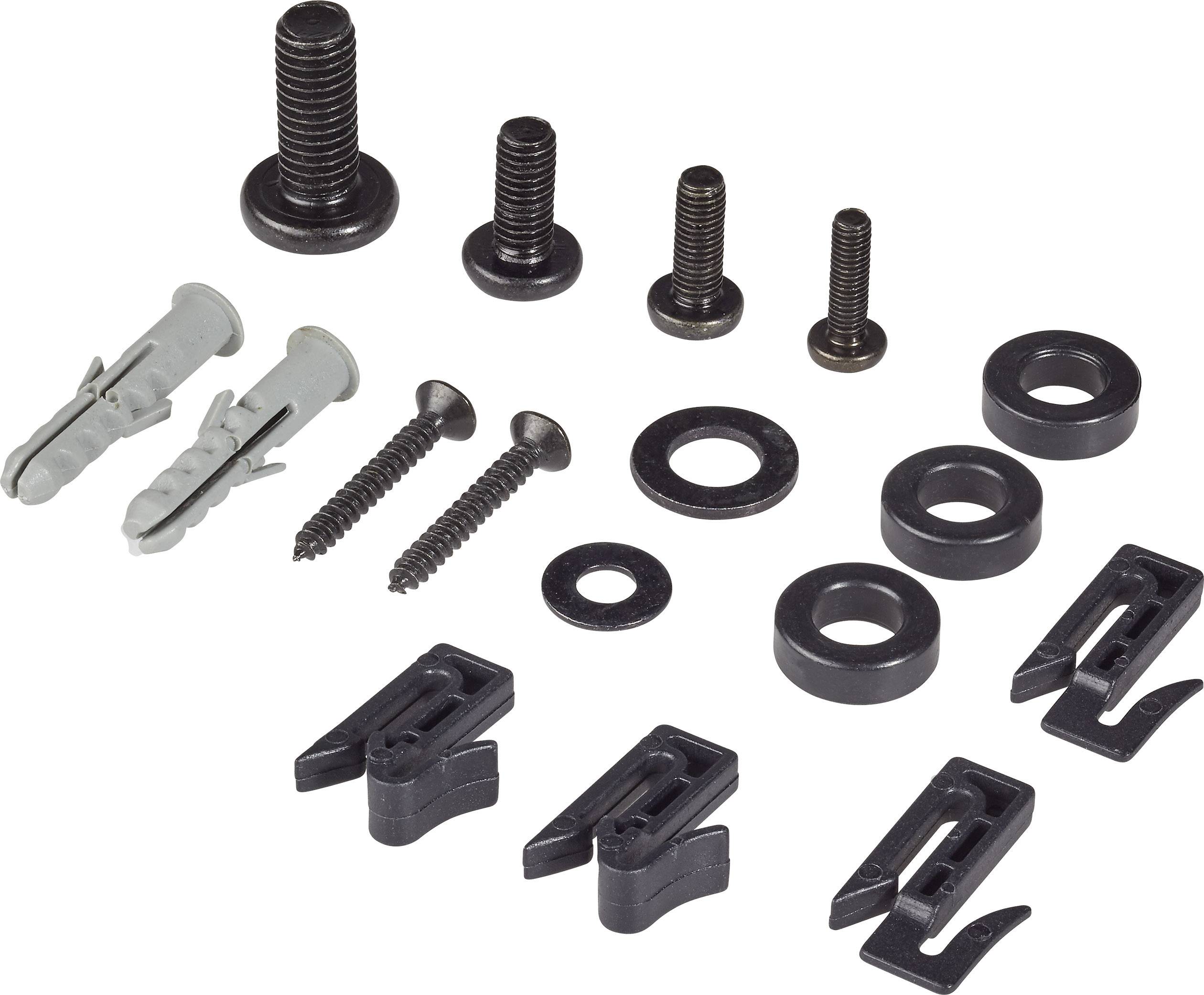 Various mounting accessories: Screws, wall plugs and clips in different sizes are laid out on a white surface.